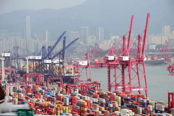 Why are workers at many shipping ports on strike?